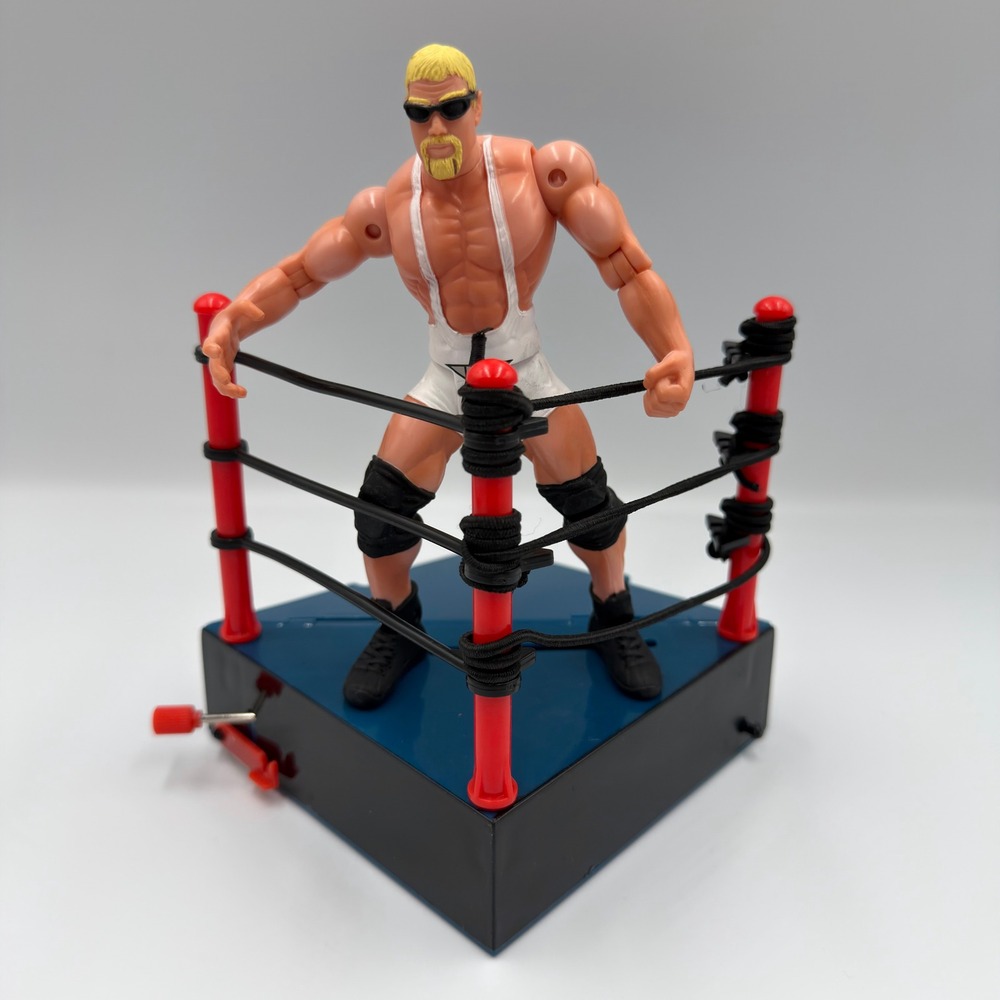 1999 WCW Toy Biz Scott Steiner nWo Action Figure with Vibrating Ring Corner Base